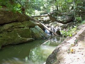 Wild brown stream massive hole