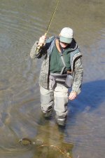 Frits landing a trout.JPG